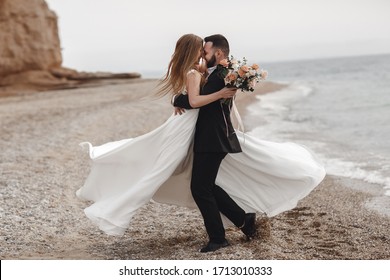 Wedding couple at the beach near the sea