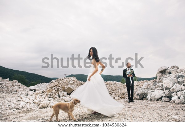 bride dancing with dog