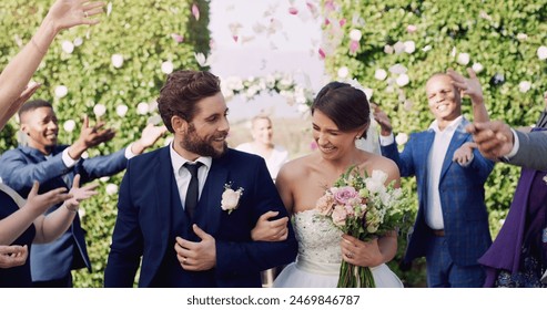 Wedding, couple and happy at celebration with petals, friends and family at venue. Bride, groom and happiness at marriage for commitment, bouquet and audience with confetti and excited or love - Powered by Shutterstock