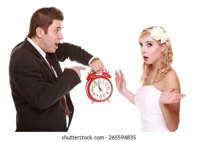 Wedding couple having argument, bad relationships. First crisis in marriage. groom looking at clock, stressed pressured by lack running out of time, Isolated on white
