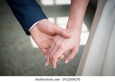 Wedding Couple Holding Hands