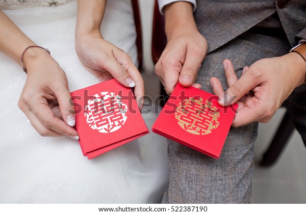 Wedding Couple Holding Red Envelope Packet Stock Photo Edit Now