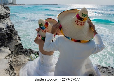 Wedding couple are modeling some mexican charro hat - Powered by Shutterstock