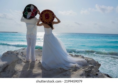 Wedding couple are modeling some mexican charro hat