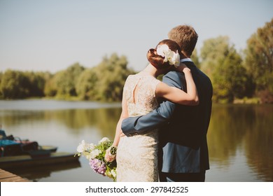 Wedding Couple On The Lake