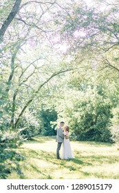 Wedding couple in the Park hugging and kissing. Photo shoot in the style of fine art in nature. - Shutterstock ID 1289015179