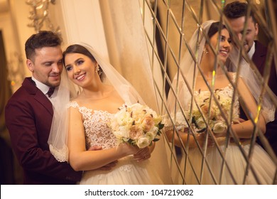 https://image.shutterstock.com/image-photo/wedding-couple-posing-front-luxury-260nw-1047219082.jpg
