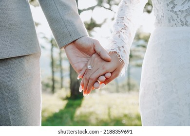 Wedding couple ring outdoor photoshoot