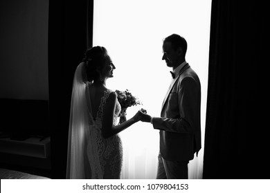 Wedding couple. Silhouete of bride and groom - Shutterstock ID 1079804153