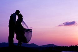 Wedding Couple With The Sunset