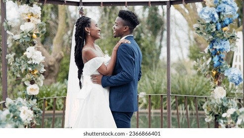 Wedding, dance and black couple in garden with love, celebration and excited future together. Gazebo, man and woman at luxury marriage reception with flowers, music and happiness at party in nature.