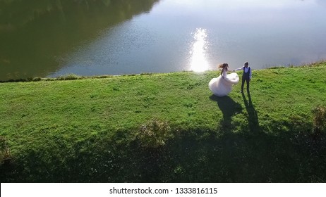 wedding dance. wedding day. newlyweds are dancing on the waterfr - Powered by Shutterstock