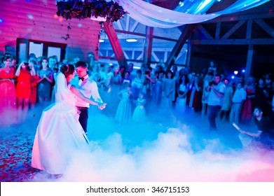 Wedding Dance In Restaurant With Varioius Lights And Smoke