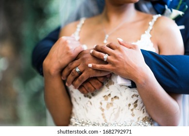 Wedding Day Couple Holding Hands - Powered by Shutterstock