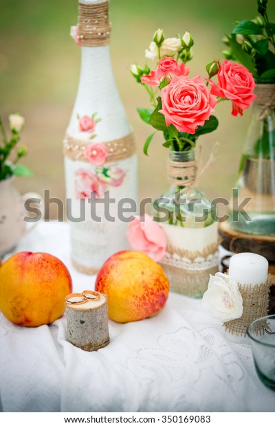 Wedding Decor Wedding Rings Peaches Bottles Stock Image Download Now