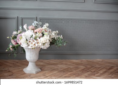 Wedding Decorations With Flowers. Classic Interior, Copy Space For Text. White Vase On The Floor With Flowers. Dark Gray Wall