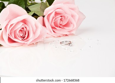 Wedding diamond ring with pastel pink roses