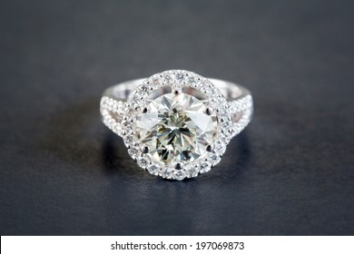 Wedding Diamond Rings On The Black Background