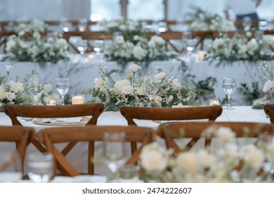 Wedding dinner table reception, wooden chair in wedding - Powered by Shutterstock