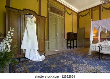 Wedding Dress Hanging In Bridal Suite