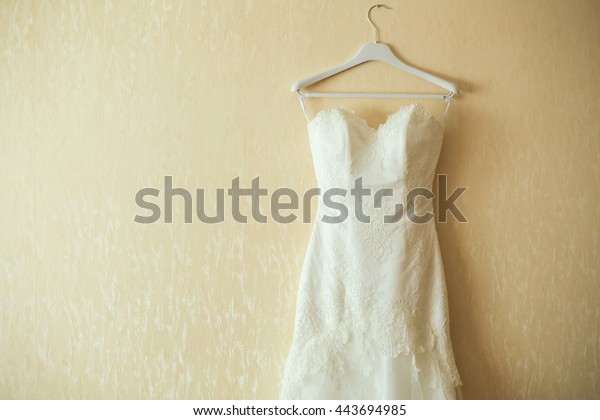 Wedding Dress On Hanger On Wall Stock Photo 443694985 | Shutterstock