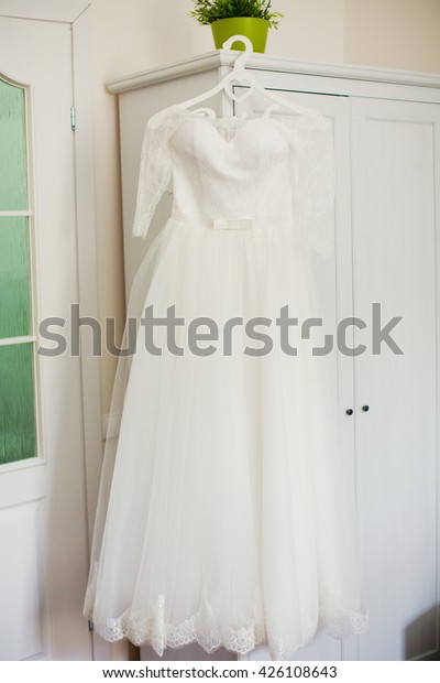 Wedding Dress On Wooden Hanger Stock Photo Edit Now 426108643