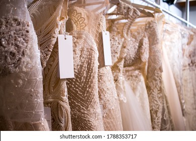 wedding dresses on clothes rail hanging rail fair trade bridal week 