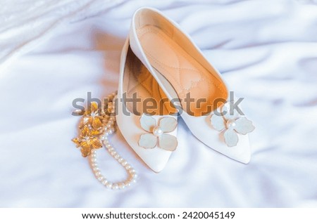 Wedding or Evening white shoes with Pointed toe and brooch, pearls decorated, accessorize