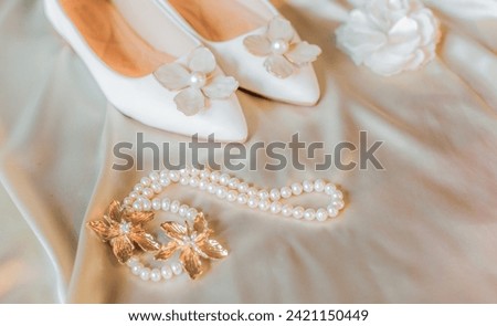 Wedding or Evening white shoes with Pointed toe and brooch, pearls decorated, accessorize