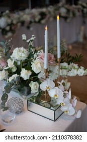 Wedding Flower Set Up With White Orchid And White Candle