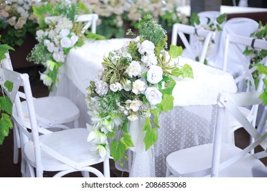 Wedding Flowers, Closeup Decoration Made Of Flowers And Ornamental Plants On A White Table, Close-up, Selective Focus, No People, Object
