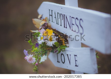 wedding flowers on arrows love happiness