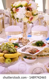 Wedding Food Table, Full Of Meals. Flowers And Chocolate. Dining Room, Cooking. Evening Party