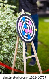 A Wedding Game Where The Newlyweds Try To Hit A Heart Shaped Target