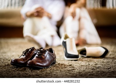 Wedding groom and bride shoes with  married couple on luxury bed background - Shutterstock ID 448281232