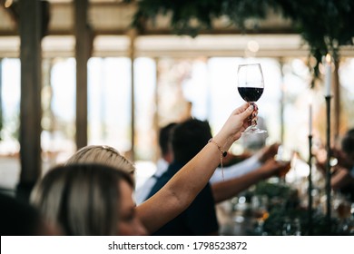 wedding guests toasting wine at a wedding in the Yarra Valley Victoria  - Shutterstock ID 1798523872