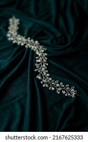 Wedding Hair Accesories On Dark Green Fabric 