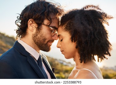 Wedding hug, interracial couple and love of people outdoor in nature for marriage and save the date. Prayer, celebration and bride with man for commitment, care and pray together feeling calm - Shutterstock ID 2253388793