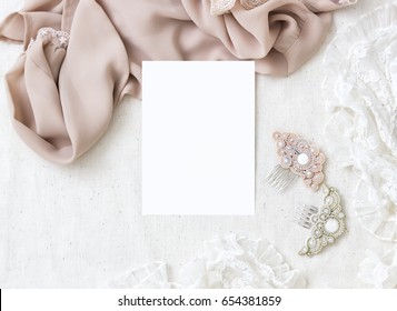 Wedding Invitation Mock Up With Pastel Pink Silk, White Lace And Barrettes. Wedding Cloth Dress Drapery Texture. Ideal For Greeting Card Or Postcard Design. White Blank Template With Space For Text