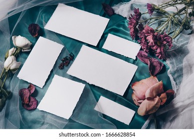 Wedding Invitation Mockup With Roses, Papers On Silk Blue Background. Top View, Flat Lay. Wedding Stationary. Perfect For Presentation Of Your Invitation, Menu, Greeting Cards