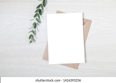 Wedding invite mockup - a mockup of a blank wedding greeting card on the table. 