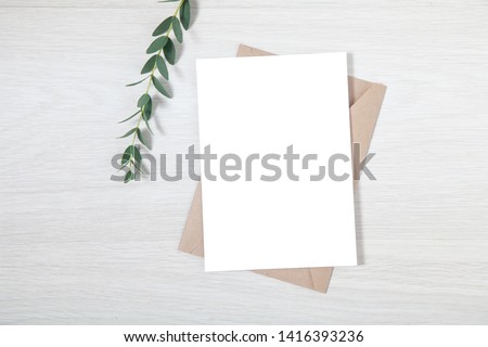 Wedding invite mockup - a mockup of a blank wedding greeting card on the table. 