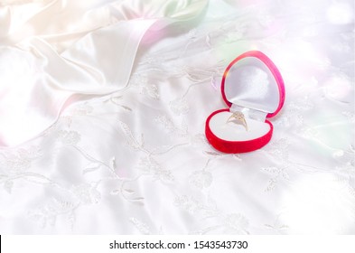 Wedding Jewellery On The Background Of Wedding Gown Material