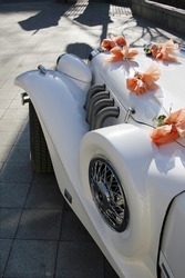 The Wedding Limousine Decorated By Tapes And Colors Expects The Groom And The Bride For Walk