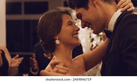 Wedding, man and woman with love, dance and happy for commitment, celebration and ceremony for couple. Venue, lovers and people with smile, night and bride with groom, marriage and event in hotel - Powered by Shutterstock