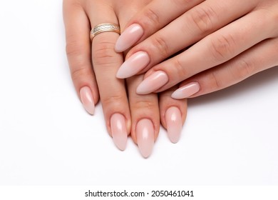 Wedding manicure white ombre on long sharp nails close-up on a white background