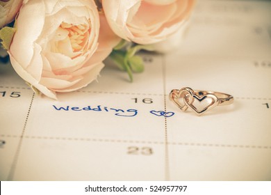 Wedding note on a calendar sets a reminder for the wedding day