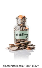 Wedding On Clear Glass Jar With Money.