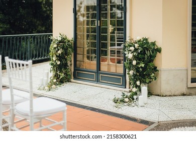 Wedding open air ceremony decor with a flourish composition. Romantic italian wedding in a villa on Lake Como