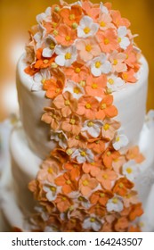 Wedding Orange Cake With Flowers And Candles